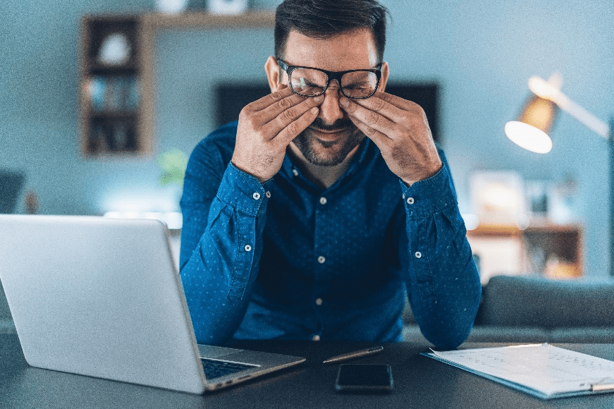 Stock image of a frustrated desk worker.